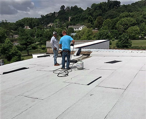 Summer Storms & Commercial Roofing
